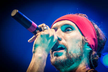 BARCELONA - SEP 22: Spanish singer Macaco performs at the "Hard Rock Rocks La Merce" concert within La Merce celebrations on September 22, 2012 in Barcelona, Spainのeditorial素材