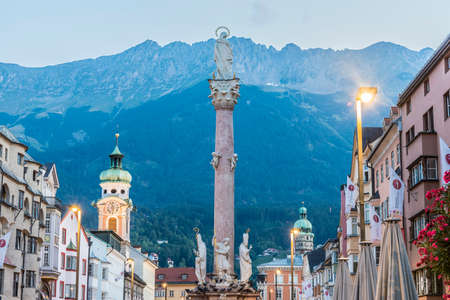 St Anne Column in Maria-Theresien Street, a statue of the Virgin Mary atop a Corinthian red marble column erected in 1706 to celebrate the withdrawal of invading Bavarian armies in Innsbruck, Austria.の写真素材