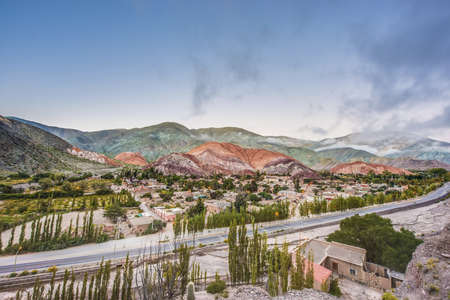Cerro de los Siete Colores (The Hill of Seven Colors) behind Purmamarca village, in the colourful valley of Quebrada de Humahuaca in Jujuy Province, northern Argentina.の写真素材