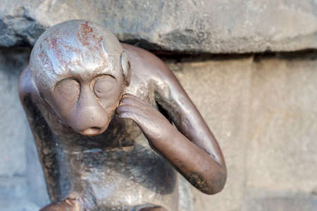 Guardhouse Monkey small iron statue outside the main entrance of the City Hall in Mons, capital of the Wallonian province of Hainaut in Belgium.の写真素材