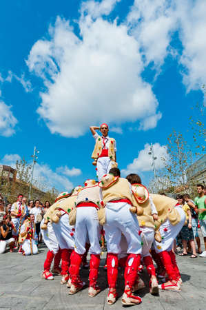 VILAFRANCA DEL PENEDES, SPAIN - AUG 29: Pastorets dancers on Cercavila performance within the Festa Major celebrations Aug 29, 2011 in Vilafranca del Penedes, Spain.のeditorial素材