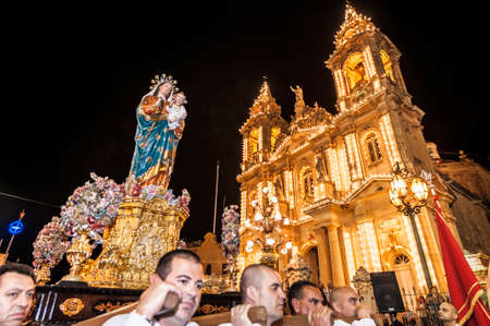 GUDJA - OCT 28: Virgin Santa Marija Assunta night devout procession on October 28, 2012 in Gudja, Malta.のeditorial素材