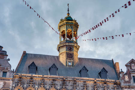 Gothic style City Hall and it's renaissance bell tower on the central square in Mons, capital of the Wallonian province of Hainaut in Belgium.のeditorial素材