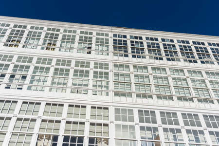 Traditional white wooden glazed windows in A Coruna, Galicia, Spain.のeditorial素材
