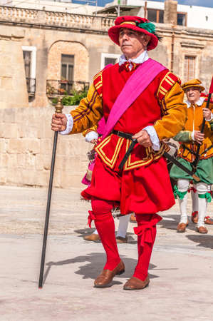 BIRGU - NOV 04: In Guardia re-enactment portraying the inspection of the fort and its garrison by the Grand Bailiff of the Order of the Knights of St. John on November 04, 2012 in Birgu, Malta.のeditorial素材
