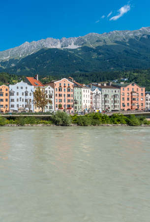 INNSBRUCK, AUSTRIA - AUG 16: Inn river, a 517 kilometres long tributary of the Danube on its way through the capital of Tyrol region on Aug 16, 2013 in Innsbruck, Austria.の写真素材