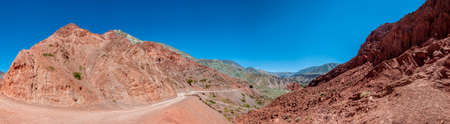 Los Colorados path in Purmamarca, near Cerro de los Siete Colores (The Hill of Seven Colors), in the colourful valley of Quebrada de Humahuaca in Jujuy Province, northern Argentina.の写真素材