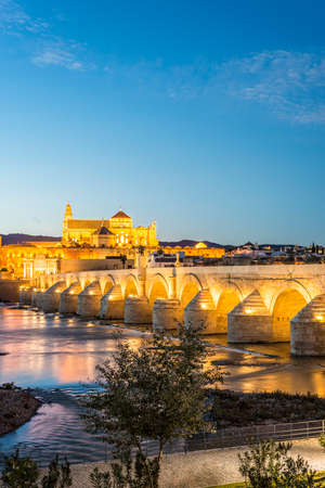 Guadalquivir river as it passes through the city of Cordoba in the province of Andalusia, Spain.の写真素材
