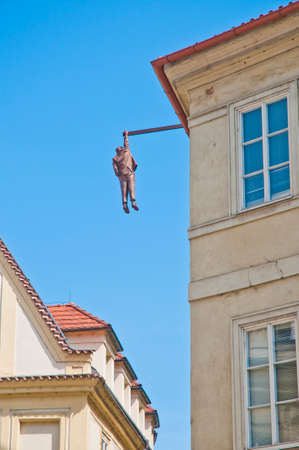 Hanging out sculpture at pragueの写真素材