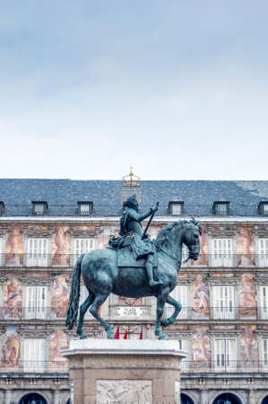 Bronze statue of King Philip III at the center of the square, created in 1616 by Jean Boulogne and Pietro Tacca on the Plaza Mayor in Madrid, Spain.のeditorial素材