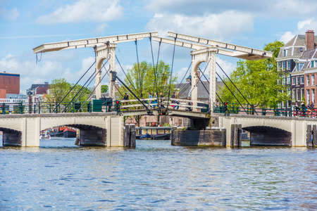 AMSTERDAM, NETHERLANDS â JUNE 16, 2013: Closed white drawbridge in Amsterdam, Netherlands.のeditorial素材
