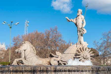Fountain of Neptune (Fuente de Neptuno), a neoclassical monument designed in 1777 at the center of the Canovas del Castillo square in Madrid, Spain.の写真素材