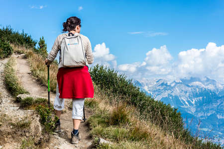 Hiker at mountain and ski area of Patscherkofel in Tyrol region, south of Innsbruck in western Austria.のeditorial素材