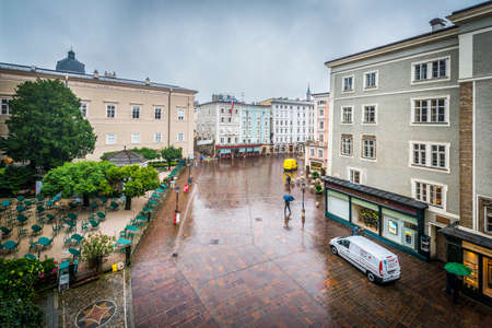 SALZBURG, AUSTRIA - JULY 31, 2014: Rainy day over Market Square in Salzburg, Austriaのeditorial素材