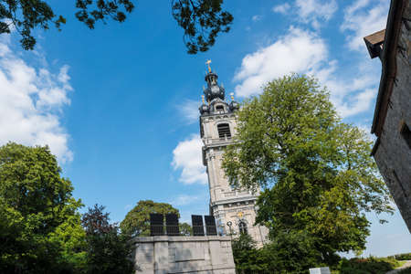 The belfry, also called El Catiau by Montois, was built in Mons in the 17th century and is the only baroque style building in Belgium that reaches a height of 87 meters.の写真素材