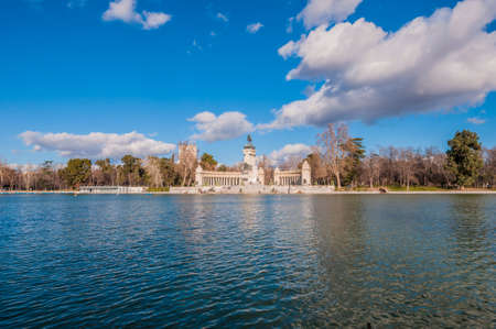 MADRID, ES â JANUARY 21, 2013: People walking near Monument to King Alfonso XII (Monumento a Alfonso XII), situated on the east edge of the artificial lake near the center of the Buen Retiro Park.のeditorial素材