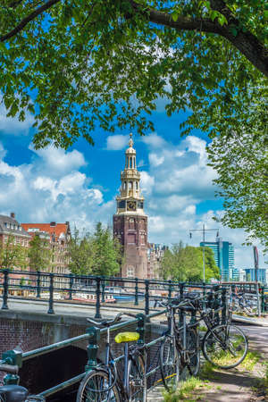The Montelbaanstoren tower on Oudeschans canal in Amsterdam, Netherlands, built in 1516 for the purpose of defending the city.のeditorial素材