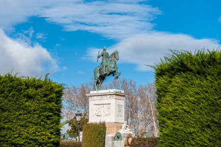 Monument to Philip IV on Plaza de Oriente Central Gardens located between the Royal Palace and the Royal Theatre in Madrid, Spain.のeditorial素材