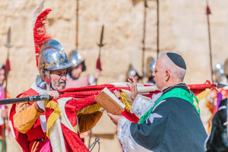BIRGU - NOV 04: In Guardia re-enactment portraying the inspection of the fort and its garrison by the Grand Bailiff of the Order of the Knights of St. John on November 04, 2012 in Birgu, Malta.のeditorial素材