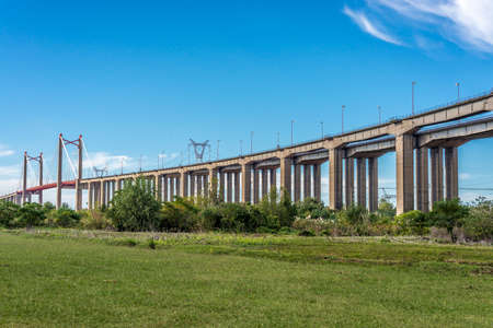 The Zarate Brazo Largo Bridges are two cable-stayed road and railway bridges in Argentina, crossing the Parana River between the cities of Zarate, Buenos Aires, and Brazo Largo, Entre Rios.の写真素材