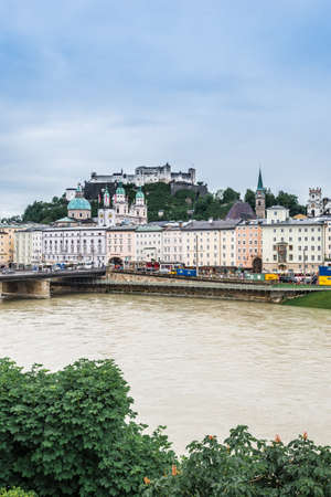 SALZBURG, AUSTRIA - MAY 31, 2016: Salzach river on its way through Salzburg city, Austriaのeditorial素材