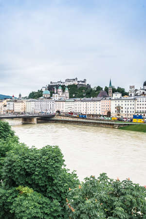 SALZBURG, AUSTRIA - MAY 31, 2016: Salzach river on its way through Salzburg city, Austriaのeditorial素材