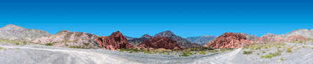 Los Colorados path in Purmamarca, near Cerro de los Siete Colores (The Hill of Seven Colors), in the colourful valley of Quebrada de Humahuaca in Jujuy Province, northern Argentina.の写真素材