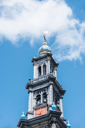 Westerkerk (Western church) next to Jordaan district, on the bank of the Prinsengracht canal in Amsterdam, Netherlands.の写真素材
