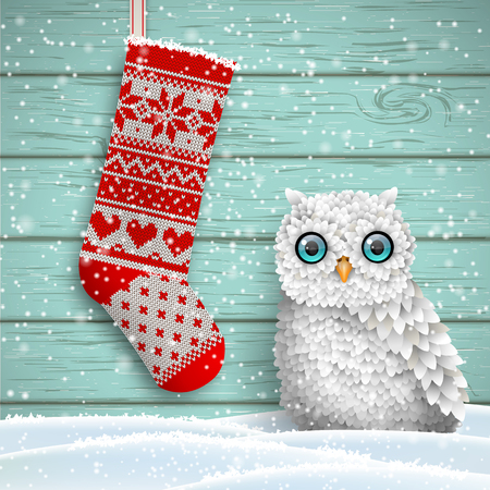 knitted christmas stocking with red patterns and cute white owl in front of blue wooden background, vector illustrationのイラスト素材