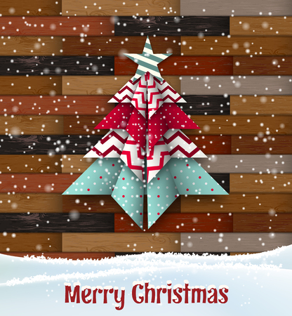 Abstract origami christmas tree on wooden backgroundの写真素材