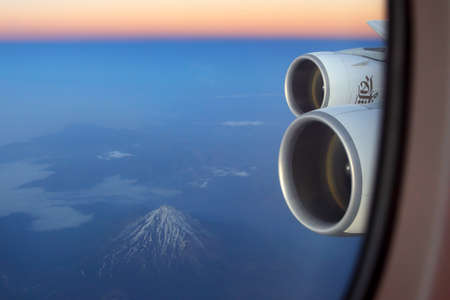 IRAN - JUNE 25, 2014: Emirates Airbus A380 wing view (Damavand volcano seen).のeditorial素材