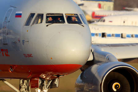 ZHUKOVSKY, MOSCOW REGION, RUSSIA - NOVEMBER 22, 2014: Aviastar-TU Tupolev TU-204C RA-64021 taxiing at Zhukovsky.のeditorial素材