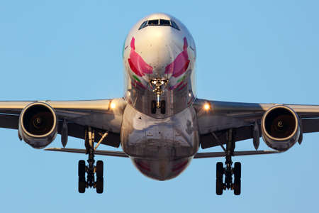 SHEREMETYEVO, MOSCOW REGION, RUSSIA - APRIL 6, 2012: China Eastern Airlines A330-343X B-6129 in special paint scheme landing at Sheremetyevo international airport.のeditorial素材