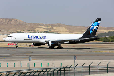 Madrid, Spain - August 12 2015: Boeing 757 of Cygnus Air airline taxiing at Madrid Barajas Adolfo...