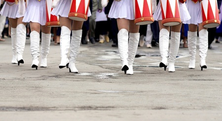 A group of young drummers marching over the square.の写真素材