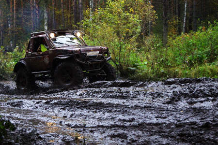 Extreme driving on dirty,muddy road 