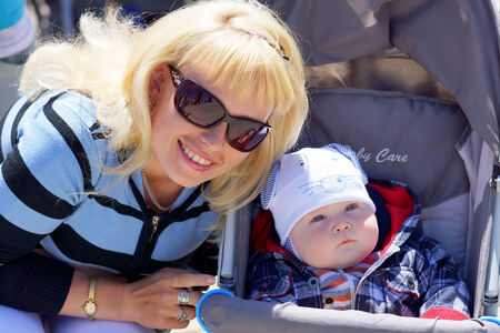 June 2013 , Beloretsk, Bashkortostan, Russia Happy young mother with a child for a walk.のeditorial素材
