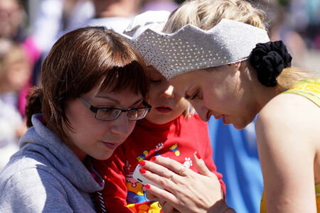 June 2013 , Beloretsk, Bashkortostan, Russia Happy young mother with a child for a walk.のeditorial素材