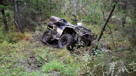 ATV stuck in the mud at overcoming mud obstacles.の写真素材