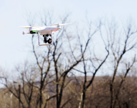 Unmanned aircraft against the blue sky.の写真素材