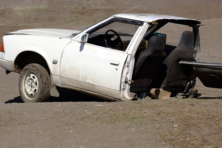 White sedan with damage to the towed after a car accident.の写真素材