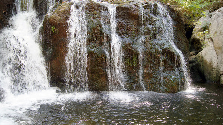 Torrents of water falling from a cliff.の写真素材