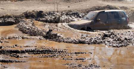 Extreme driving on overcoming mud obstacles.のeditorial素材