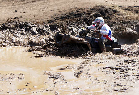 Extreme driving on overcoming mud obstacles.のeditorial素材