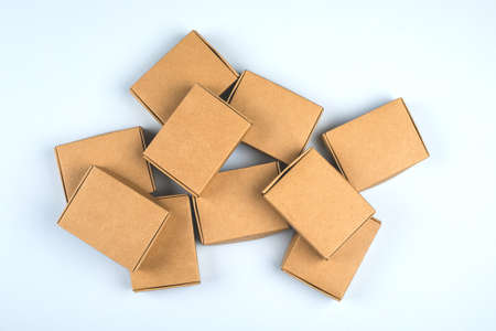 Paper boxes on light background. Top view, flat lay. Zero waste concept, eco giftsの写真素材
