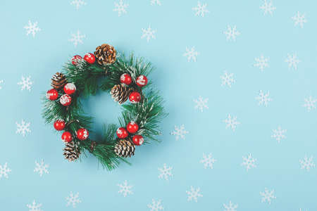 Christmas wreath. Traditional holiday decoration. Winter holidays and Christmas celebration concept. Top view, copy space, flat layの写真素材