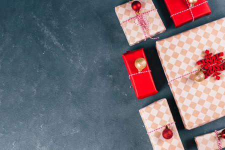 Wrapped gifts advent calendar on background. Flat lay, top view, copy spaceの写真素材