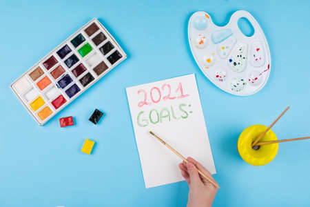 Decorating christmas gifts by dry orande, cinnamon, fir tree. Eco friendly textile gift packaging.の写真素材