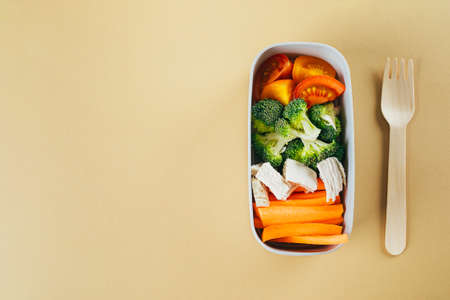 Two snack boxes with vegetables and fruits. Delicious balanced food concept. Top view, copy spaceの写真素材