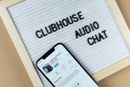 Flat lay of lightbox with text Clubhouse. Social application on the smartphone. New trendのeditorial素材